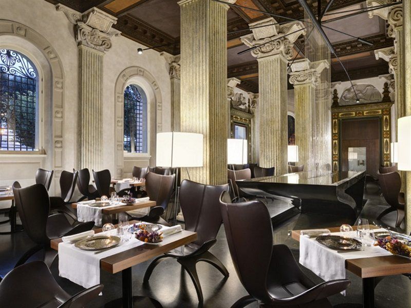 팔라초 몬테마르티니 롬, 어 래디슨 컬렉션 호텔 로마 외부 사진 The interior of the restaurant